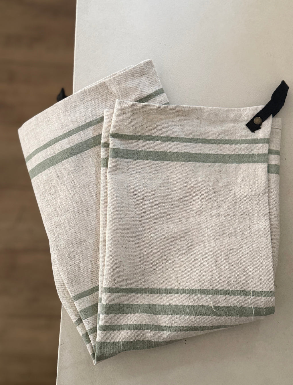 Torchon rayé vert olive